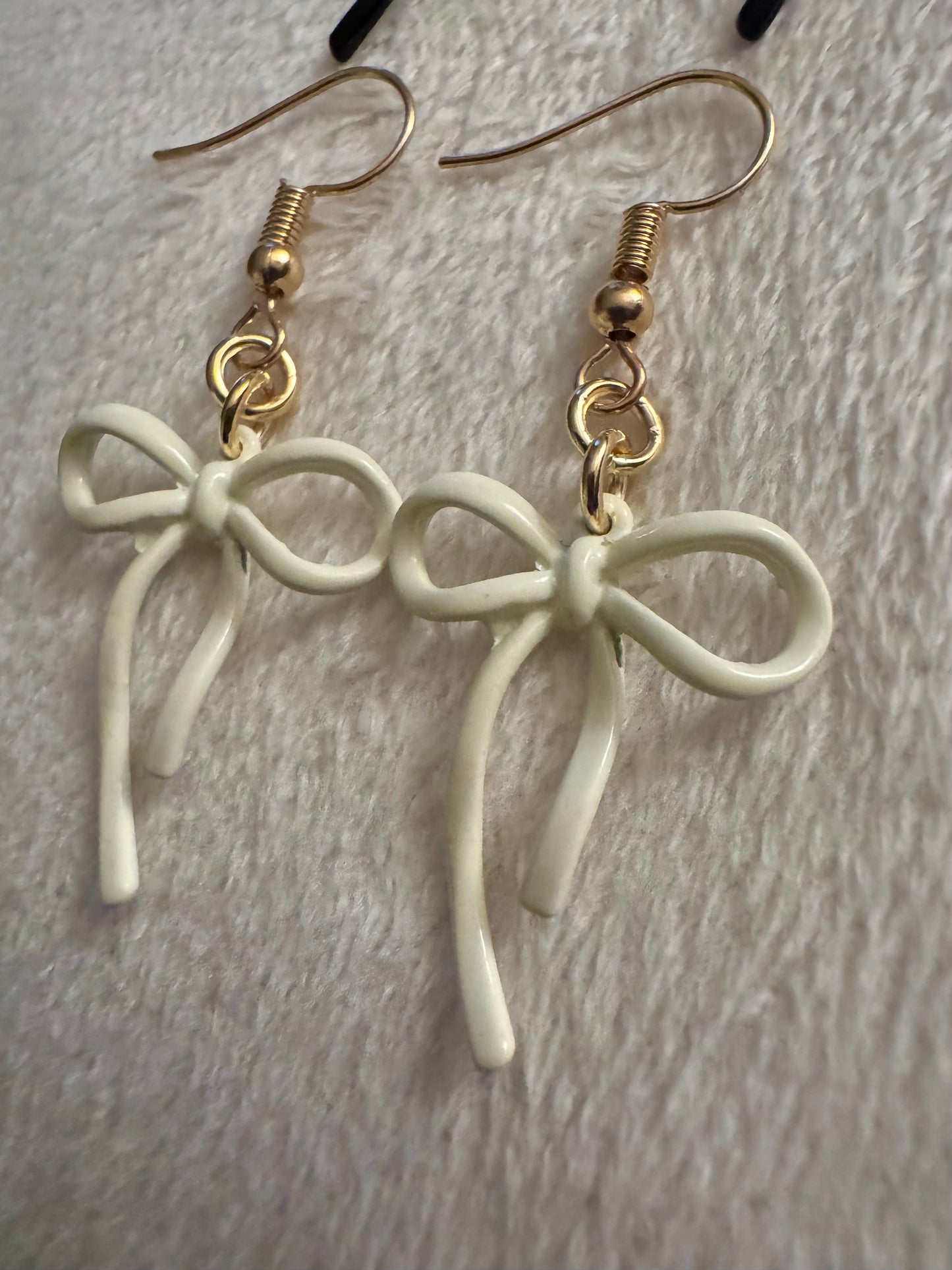 cream enamel bow earrings