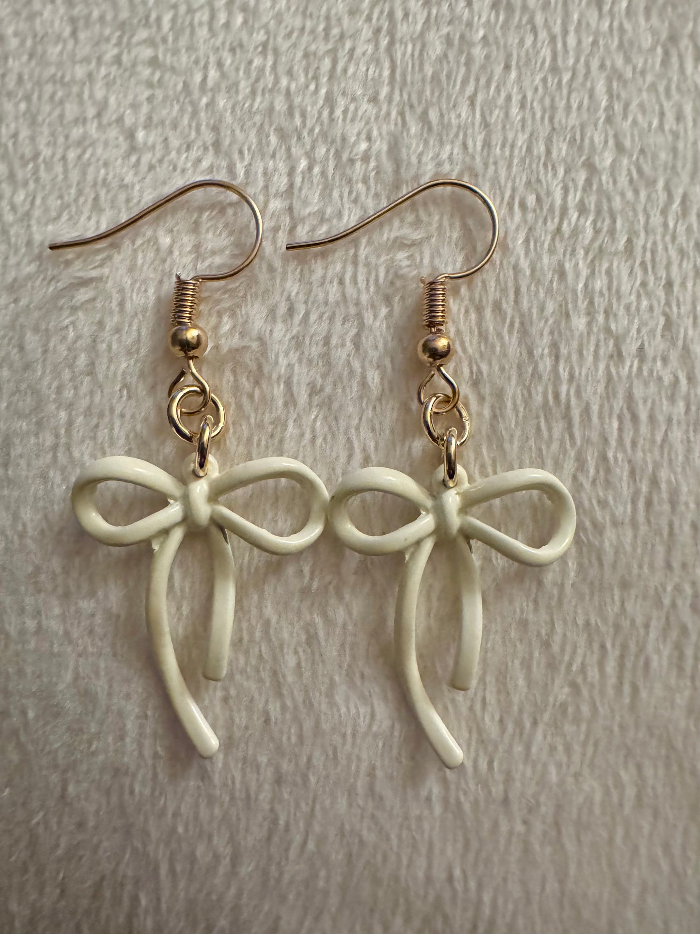 cream enamel bow earrings