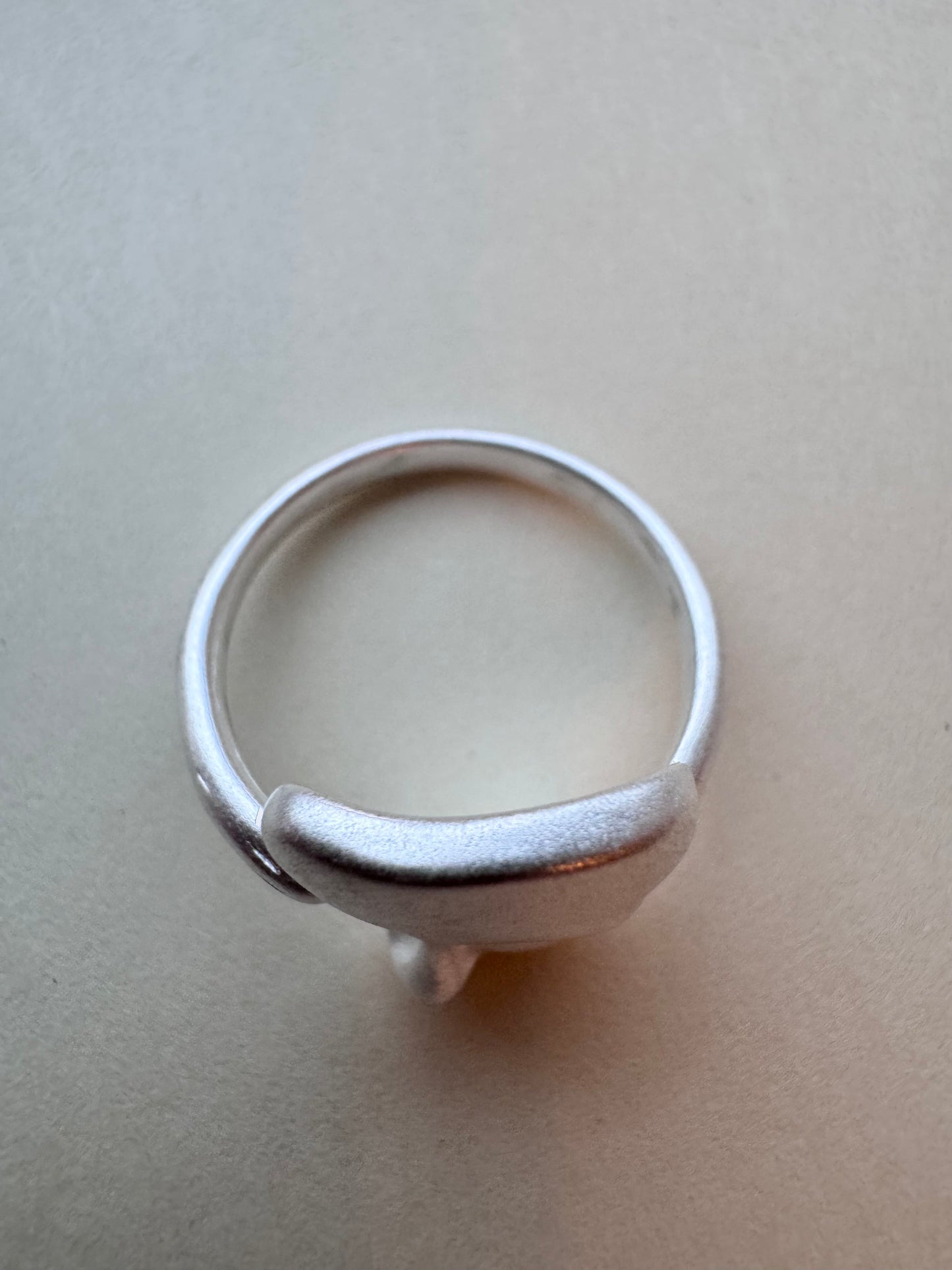 silver face ring